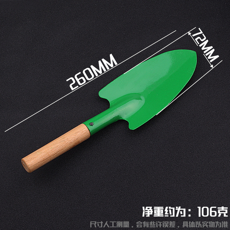 Pala de flores verdes con mango de madera