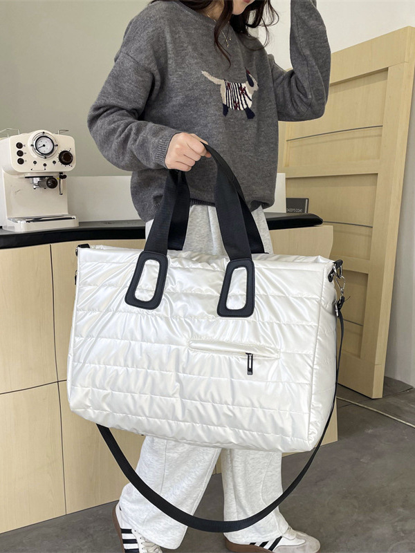 Otoño e invierno nuevo estilo de ropa de algodón de nicho bolso de mensajero de moda moderna para hombres y mujeres bolso de mensajero portátil de gran capacidad