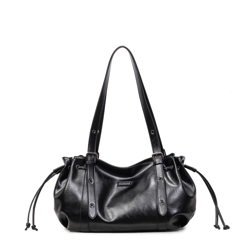 Bolso de gran capacidad para mujeres 2025, nuevo cross-border retro mochila de hombro de textura superior, bolsa de transporte de ocio