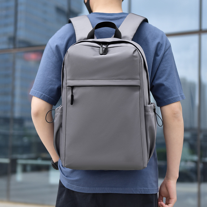Comercio exterior al por mayor 2023 nueva mochila de negocios para hombres coreanos simple color sólido de gran capacidad mochila para computadora de 15 pulgadas