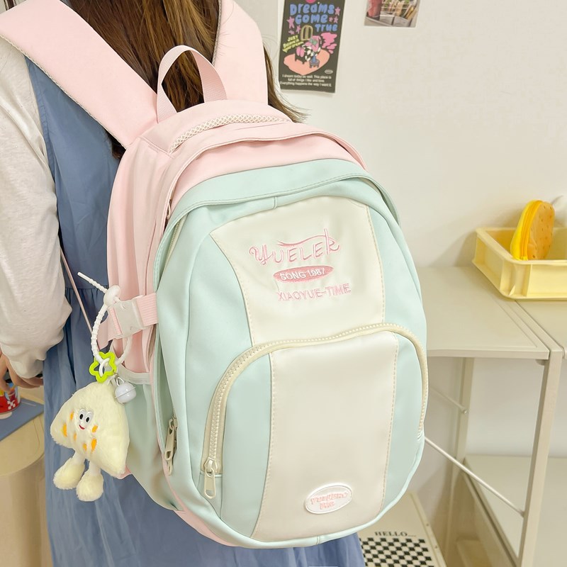 High-value ins-style niche contrast backpack tide junior high school Senior high school college students schoolbag female travel backpack wholesale