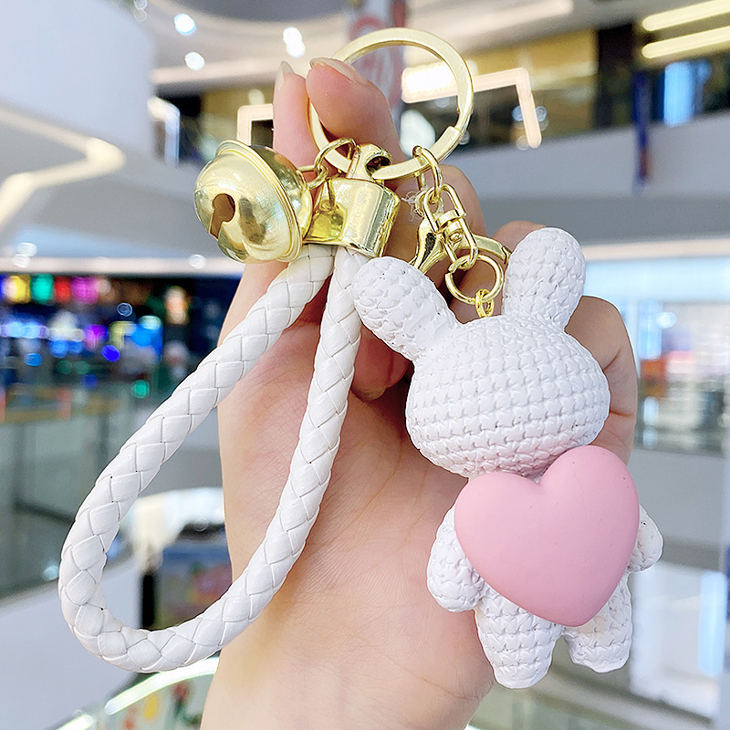 Resina creativa melocotón corazón tejido amor conejo llavero al por mayor ins pareja escuela coche llavero colgante