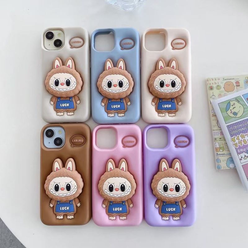漫画風のかわいいラブブ付きスタンド付きスマホケース、Apple iPhone16/15/13/14対応、シリコン製、滑り止め|undefined