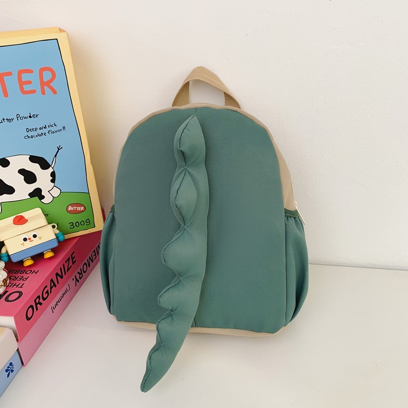 Mochila infantil transfronteriza de dibujos animados lindos dinosaurios cola mochila para niños y niñas jardín de infantes pequeña clase mochila para niños
