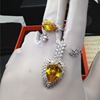 Luxury star exaggerated pear -shaped water droplet simulation diamond ring personalized yellow diamond ring S925 silver plating 18K gold foreign trade