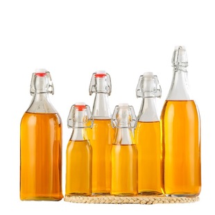 Snap round glass bottle transparent lock buckle beverage bottle juice bottle sealed glass bottle liquor bottle oil bottle sparkling wine bottle