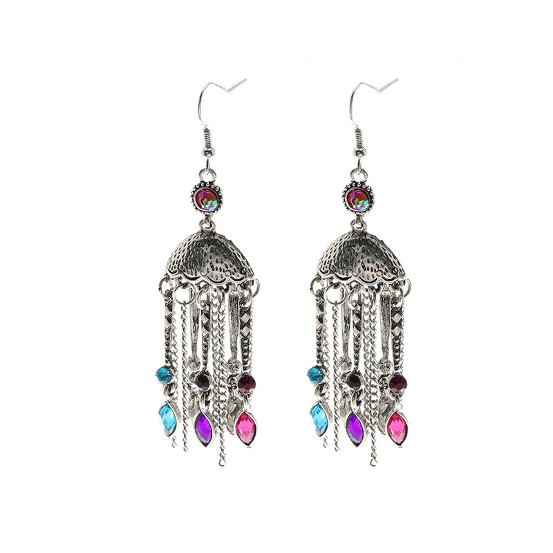 Bohemian Style Retro Long Dripping Oil Tassel Ethnic Hollow Bell Earrings display picture 8