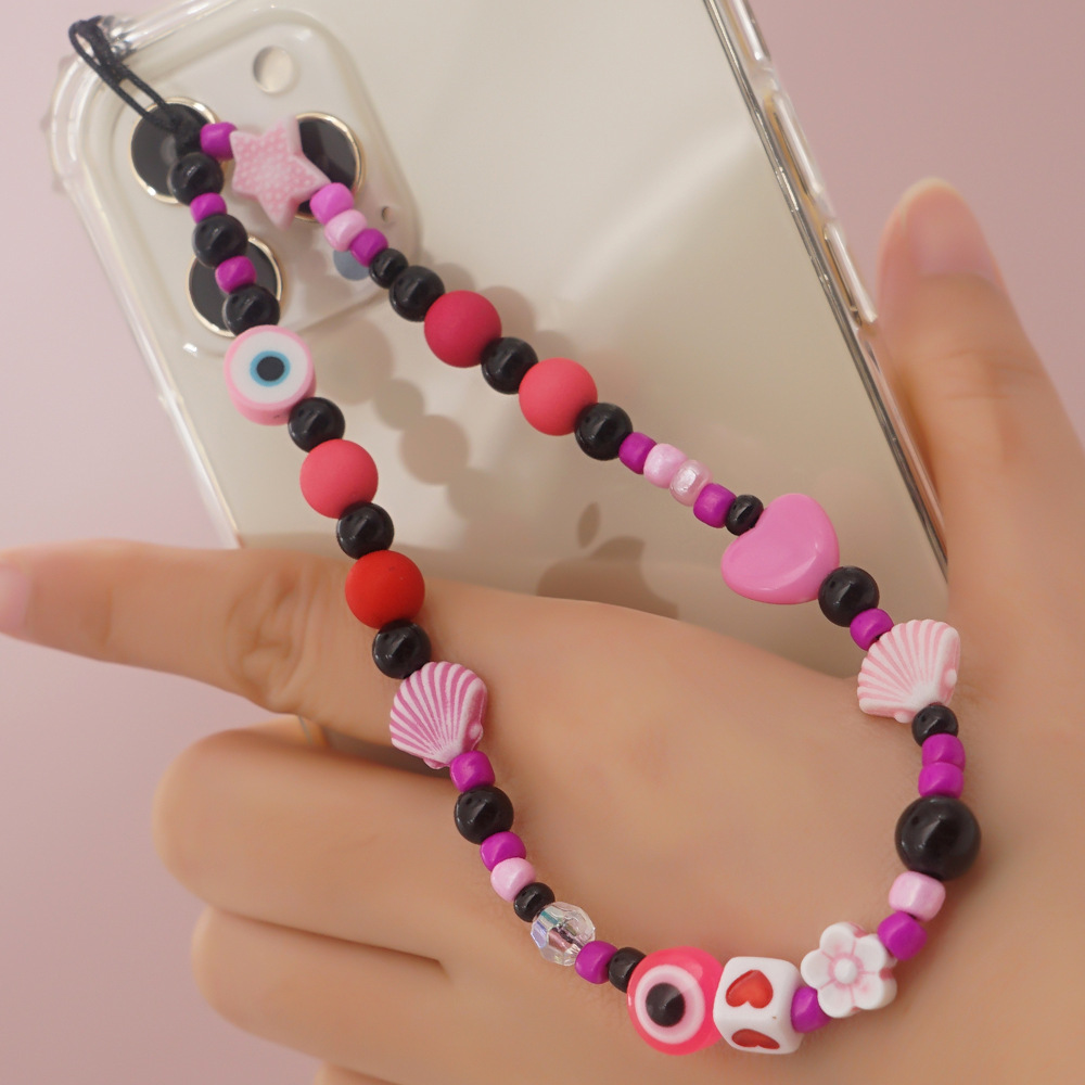Wholesale Accessories Acrylic Black Round Eye Shell Shape Beaded Mobile Phone Chain Nihaojewelry display picture 1
