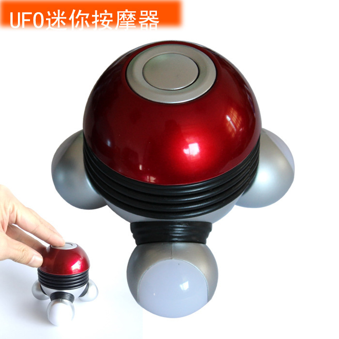 Small, mini, vibrating, electric, battery-powered, handheld, wireless massage device with three legs, three massage heads, and a triangular design for full-body massage