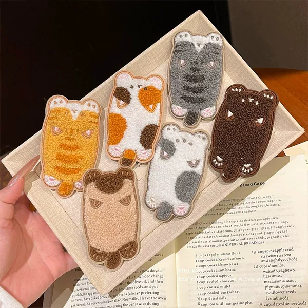 Cute cartoon cat-shaped hair clips with Velcro backing, seamless design, perfect for securing bangs and tidying up stray hairs