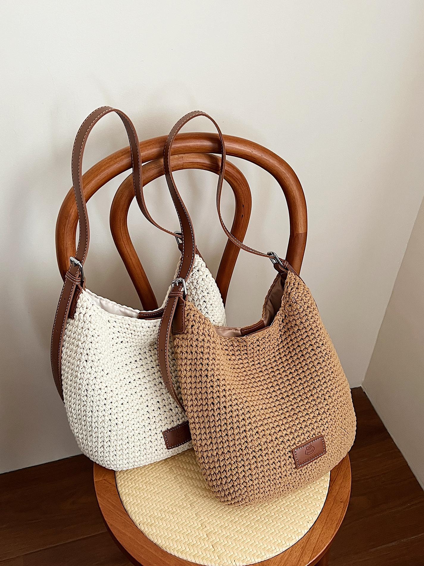 Bolso tejido hueco de estilo explosivo de verano para mujer de gran capacidad 2025 nuevo estilo de ocio junto al mar estilo vacaciones bolso tejido de paja de cercanías