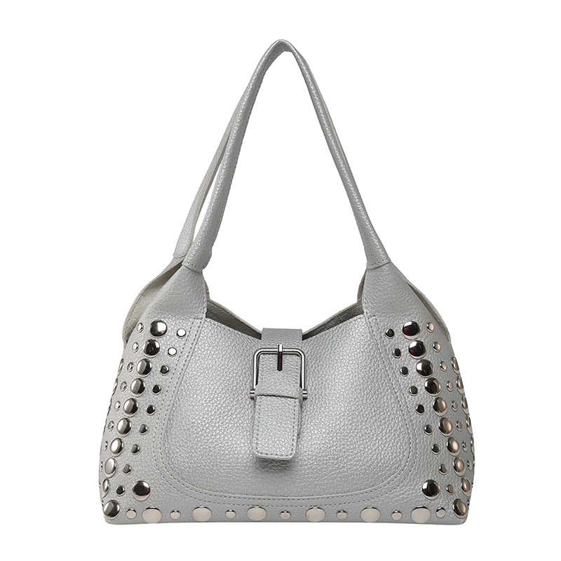 Bolso de axila con textura transfronteriza 2025 primavera y verano nuevo bolso femenino bolso retro con patrón de lichi bolso de hombro con remaches personalizado