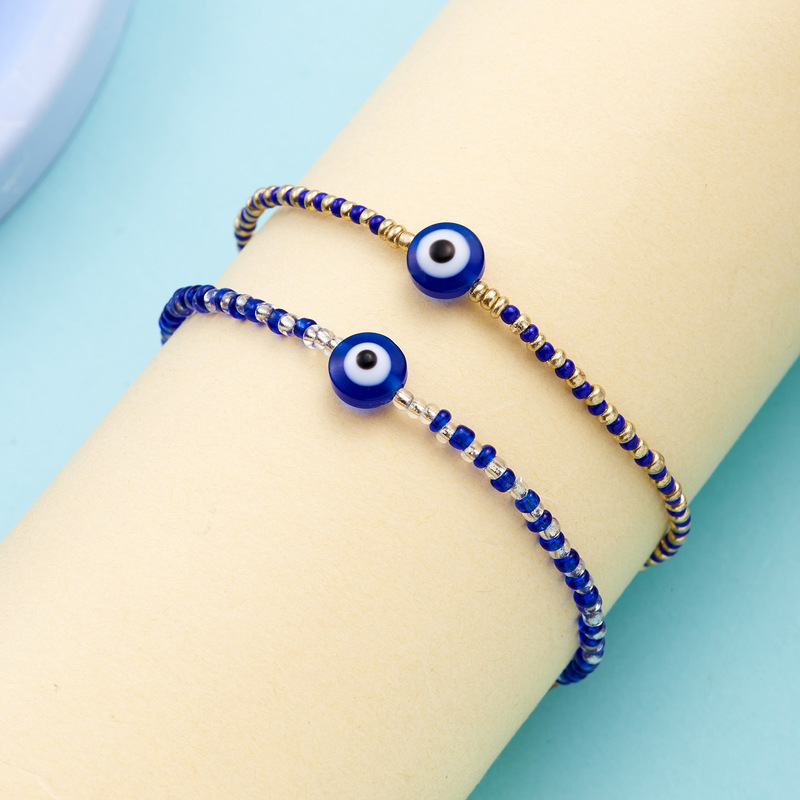 European and American cross-border new Devil's Eye bracelet blue eye transparent blue rice beads alloy bracelet in stock wholesale