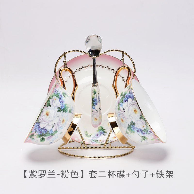 Estilo europeo elegante flor hueso China taza de café y platillo de alta gama oro británico tarde té conjunto luz lujo flor taza de té caja de regalo