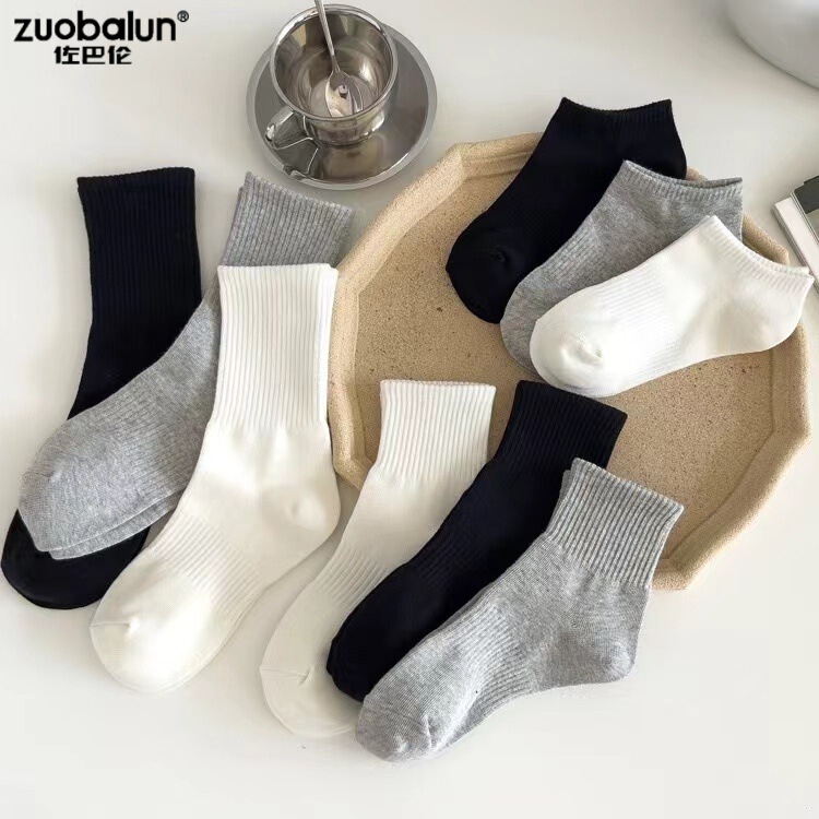 Socks spring and summer breathable sweat-absorbent men's and women's ins black and white solid color tube socks high tube lovers boat socks Zhuji socks