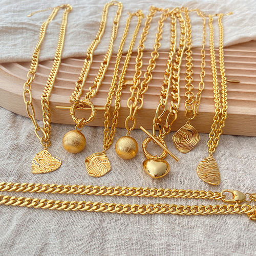 Gold-plated neutral European and American heavy metal chain lockets with small gold balls, irregular retro necklace