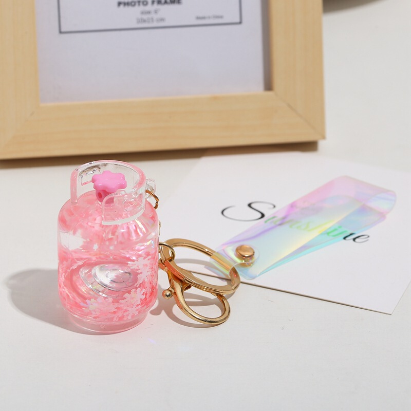 Acrylic oil snowflake key chain creative gas tank luminous drift bottle couple bag key pendant Acrylic oil snowflake key chain creative gas tank luminous drift bottle couple bag key pendant