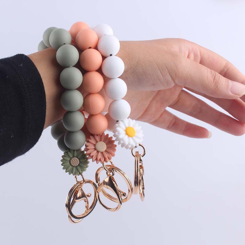 Nueva pulsera de silicona accesorios llavero creativo de dibujos animados Margarita colgante de cuentas de silicona pulsera llavero