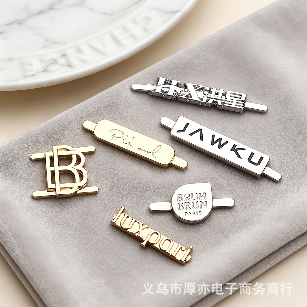 可定制五金logo牌电镀仿金滴油黑色珐琅金属插脚标签镍色合金标签