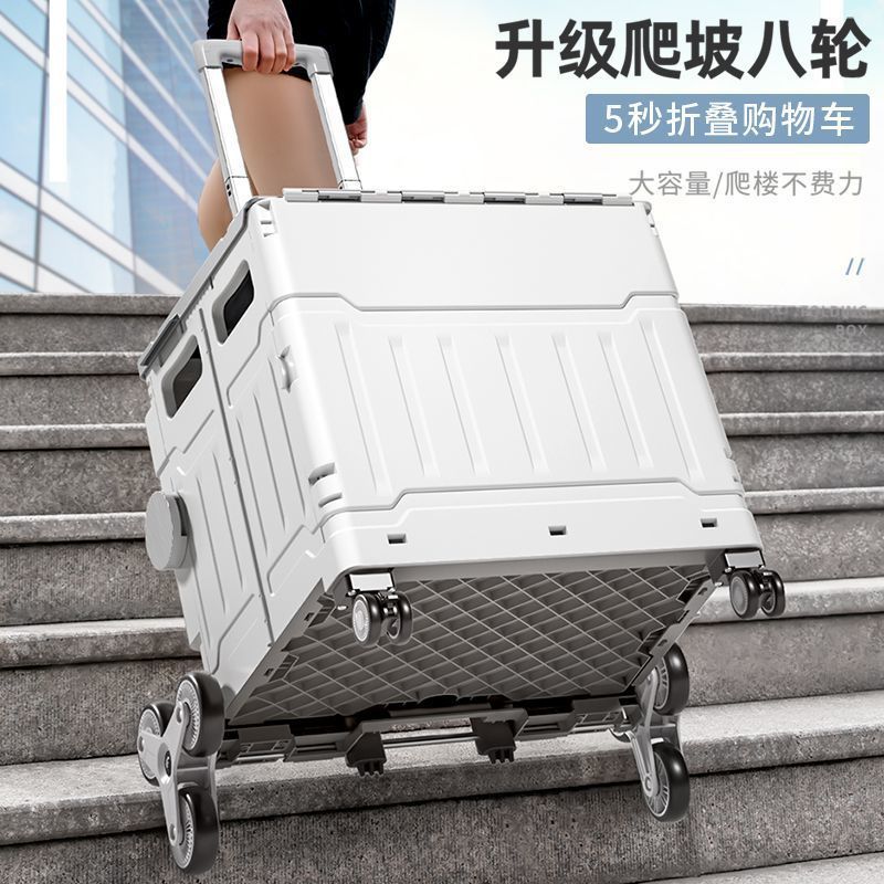 野菜を買う車の家庭用折り畳みショッピングカートは宅配便のカートトレーラーを取って車を引っ張る|undefined