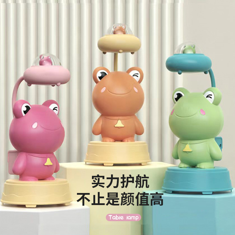 Dibujos animados astronauta Rana dinosaurio unicornio sacapuntas lámpara de mesa USB recargable habitación de los niños LED protección de los ojos lámpara de mesa