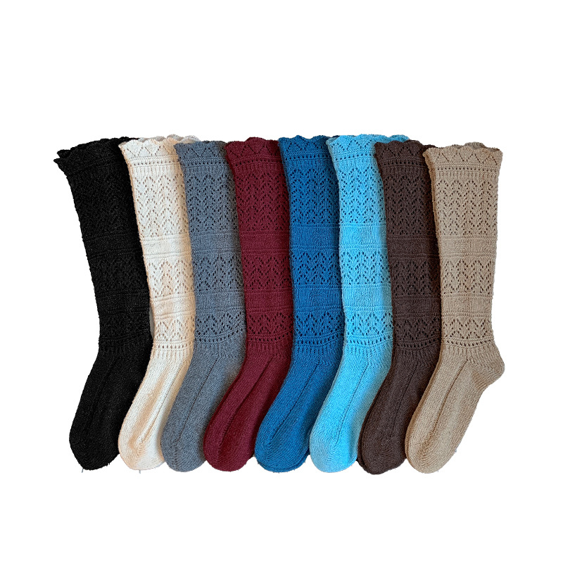 Botas de algodón Miu serie de calcetines de pila otoño invierno relieve calcetines de pantorrilla hueco calentamiento de punto retro gris pesado tubo largo