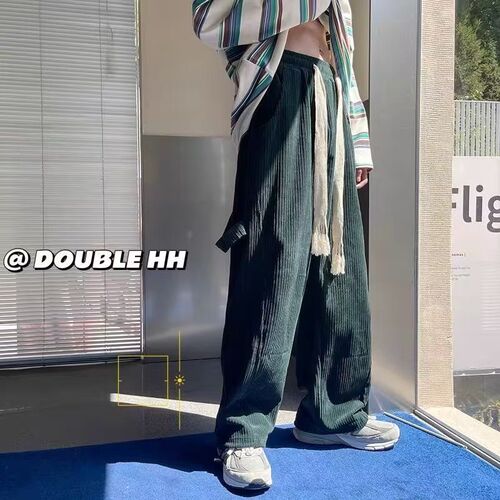 Spring corduroy pants for men: relaxed-fit, straight-leg, trendy Instagram-inspired casual trousers with a flowing, versatile design—perfect for both streetwear and sporty looks.