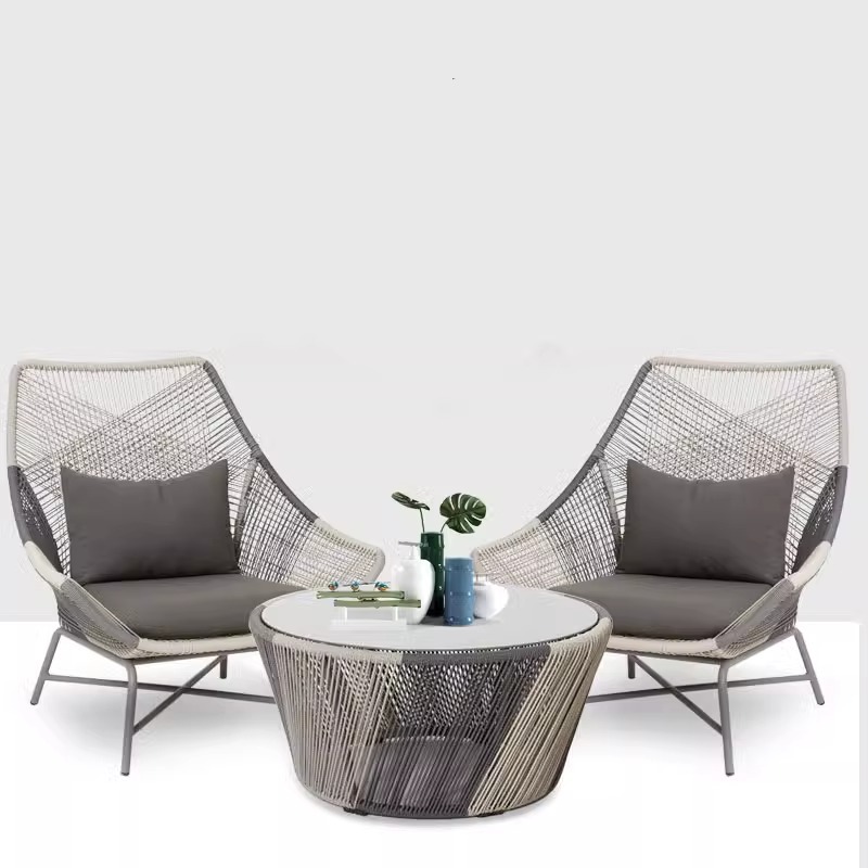 Mesa y silla al aire libre silla de caña balcón red mesas de té set de tres piezas de ocio individual muebles sofá silla de caña patio al aire libre