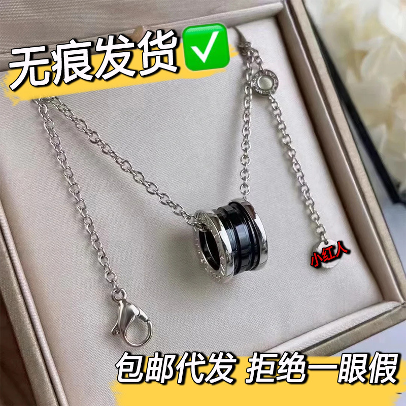 High-End Version of the Baojia Little Red People Charity Necklace, Cnc Black Ceramic Spring Waist-Shaped Trendy Clavicle Chain for Men and Women High-End Version of the Baojia Little Red People Charity Necklace, Cnc Black Ceramic Spring Waist-Shaped Trendy Clavicle Chain for Men and Women
