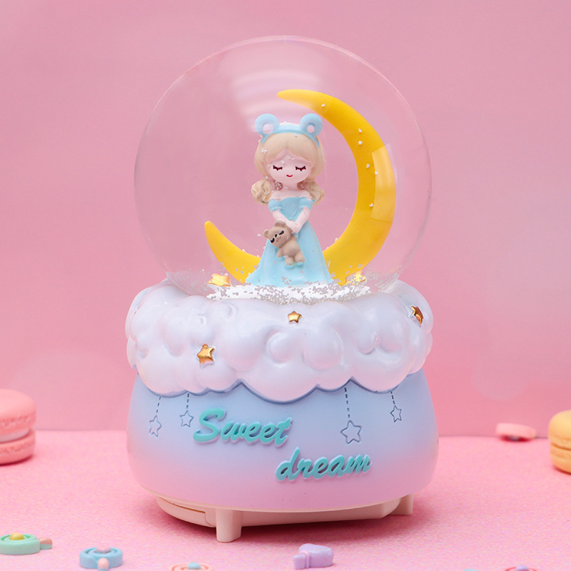 Dibujos animados creativo sueño mariposa bola de cristal caja de música nieve luminosa decoración de escritorio regalo de cumpleaños para niños al por mayor