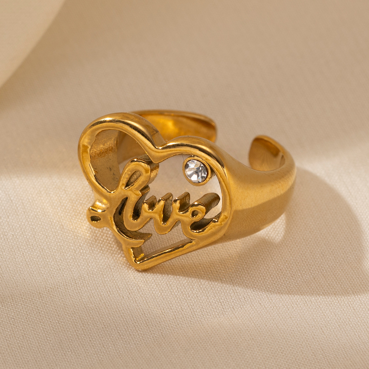 Anillo de acero inoxidable TENA Europa y América lujo ligero de lujo de moda de alto nivel amor abierto anillo de acero de titanio no se desvanece joyería