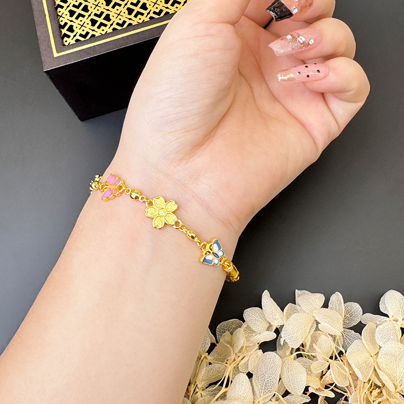 Nuevo estilo chino vietnamita arena oro mariposa flor pulsera no se desvanece durante mucho tiempo versátil retro alta sensación de joyería brazalete suministro
