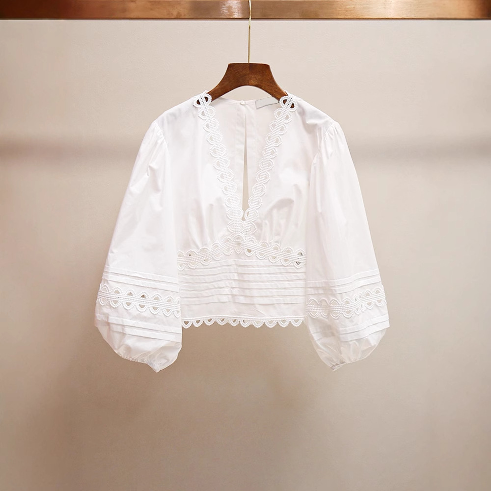 S family spring and summer new French gentle temperament design hollow bow bubble sleeve short shirt top women