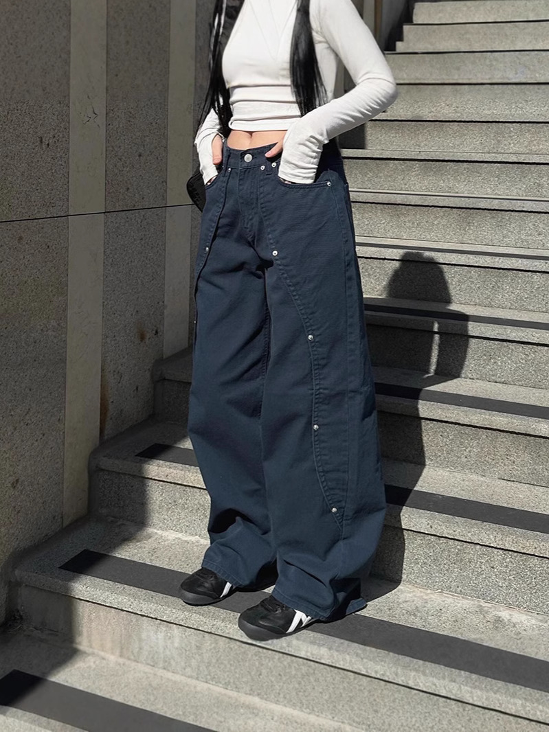 Estilo americano calle dulce y fresco diseño de remaches irregularmente sueltos jeans rectos moda femenina todo fósforo color sólido casual
