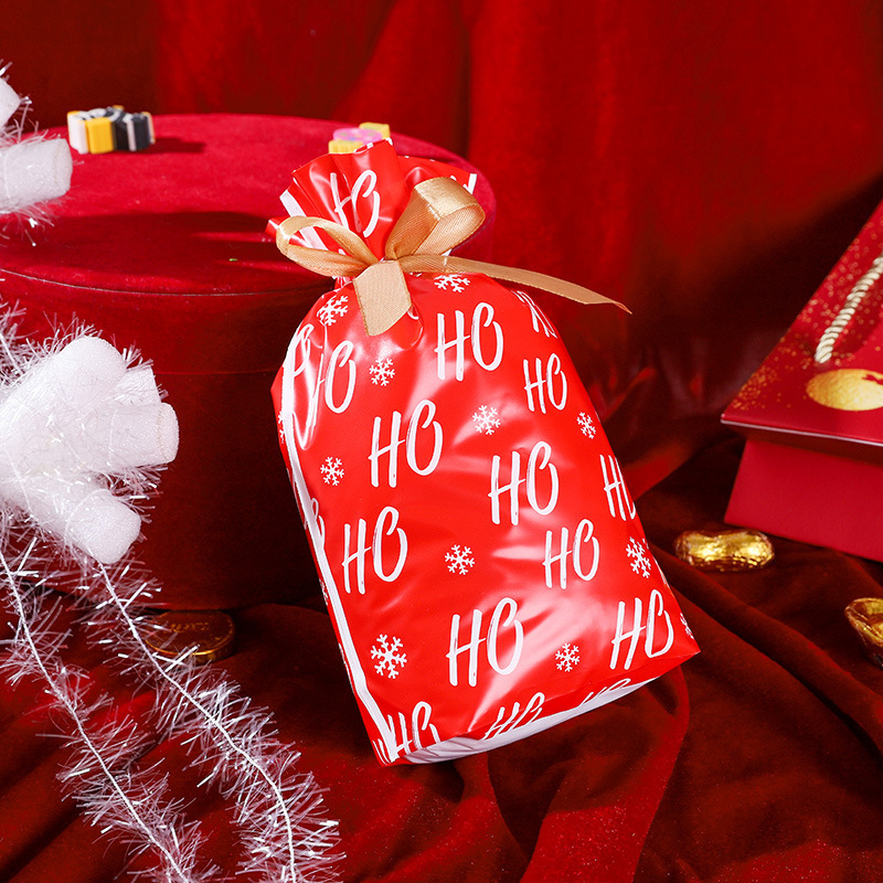 クロスボーダー専用の大サイズのプラスチック製のプレゼント袋、クリスマスイブの口にプレゼント袋を包装します。|undefined