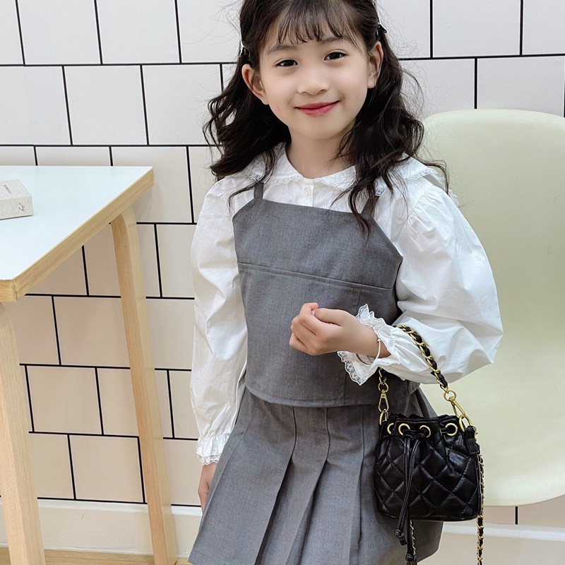 Bolso de hombro para niños y niñas Lingge de moda, cordón de aire extranjero, bolso de cubo de bebé de color sólido simple, nuevo bolso de cadena para niños