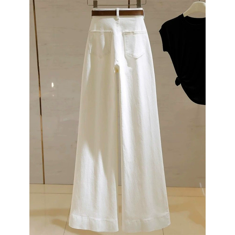Apricot colored spring jeans, trousers, megaphone, high waist, trend of season, loose straight fit