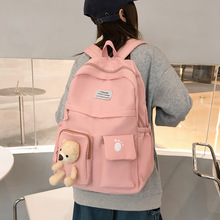 新款純色學生書包初高中小熊玩偶背包大容量帆布雙兜雙肩包批發