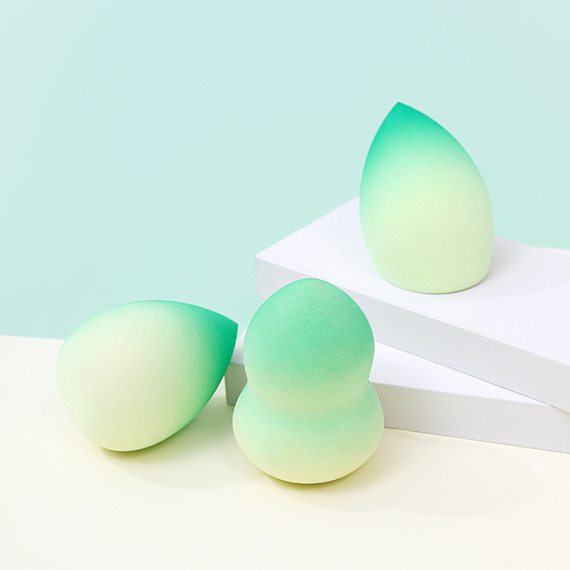 Fábrica personalizada de color degradado transfronterizo maquillaje de belleza huevo soplo de polvo no látex color en aerosol color mixto maquillaje esponja maquillaje huevo al por mayor