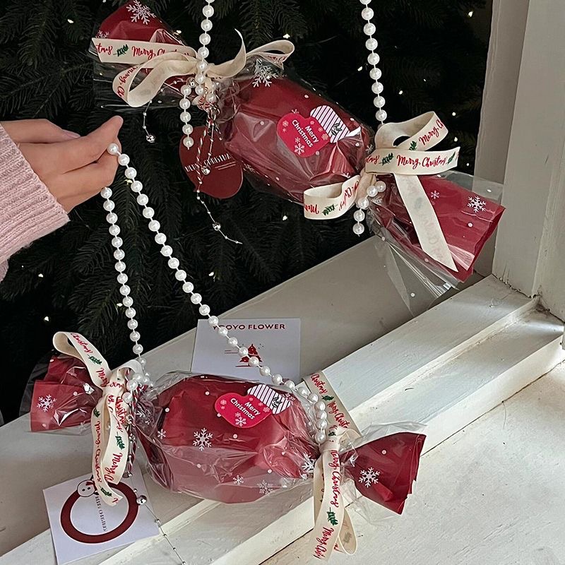 Nochebuena, bolsas de mano de manzana hechas a mano, bolsas de materiales DIY, regalos de Navidad, flores de dulces de Navidad.