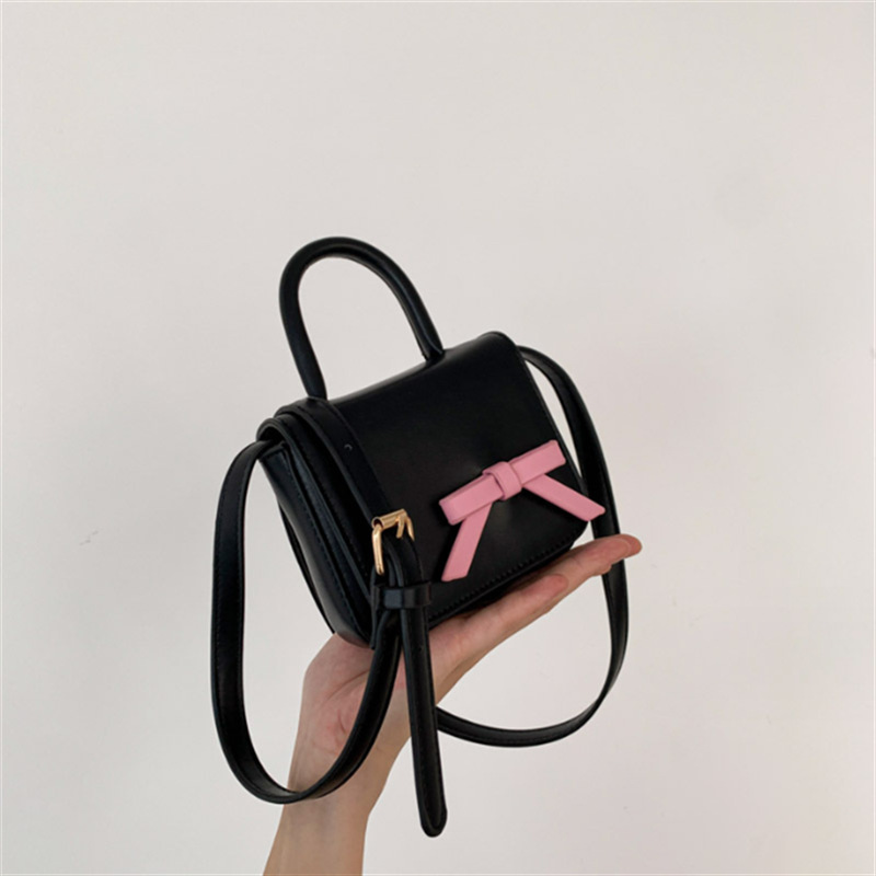 2025 primavera y verano estilo caliente moda casual niños dulces bolsa de gelatina mini bolso de mensajero de un solo hombro variedad al por mayor