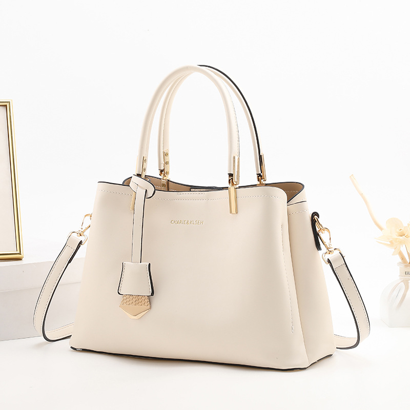 Hong Kong compra bolsos primavera y verano mujer 2025 nuevo bolso de viajero de gran capacidad salvaje bolso de mensajero de alta calidad
