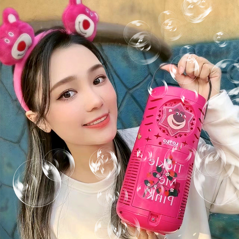 Nuevas máquinas de burbujas transfronterizas de Disney Strawberry Bear Fuegos artificiales burbujas pistola de burbujas automática juguetes para niños al aire libre
