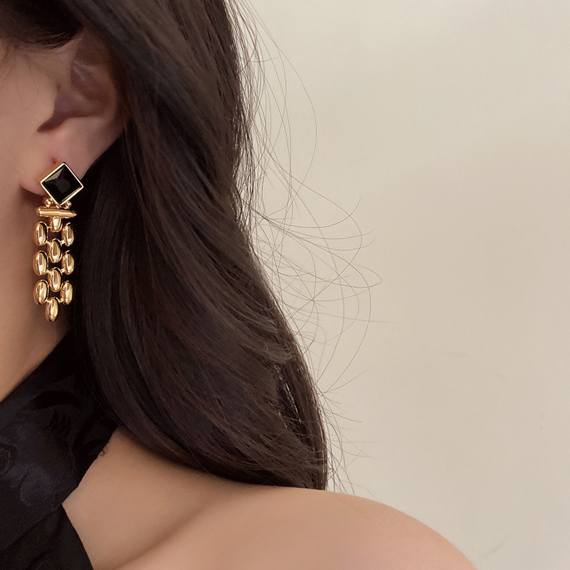 European and American chain earrings metal woven tassel fashion pendant earrings female s925 silver needle advanced gold plated ear jewelry