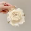 Beige crab pin, flowered