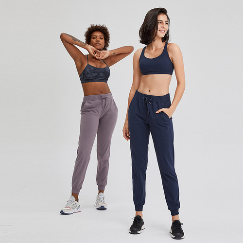 Spring and summer new style elastic waisted yoga pants, simple straight sports and casual elastic leg-tie nine-point pants for women