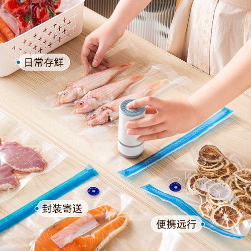 Small handheld electric air pump fully automatic vacuum packaging machine mini household mini fresh-keeping machine pumps compression bags