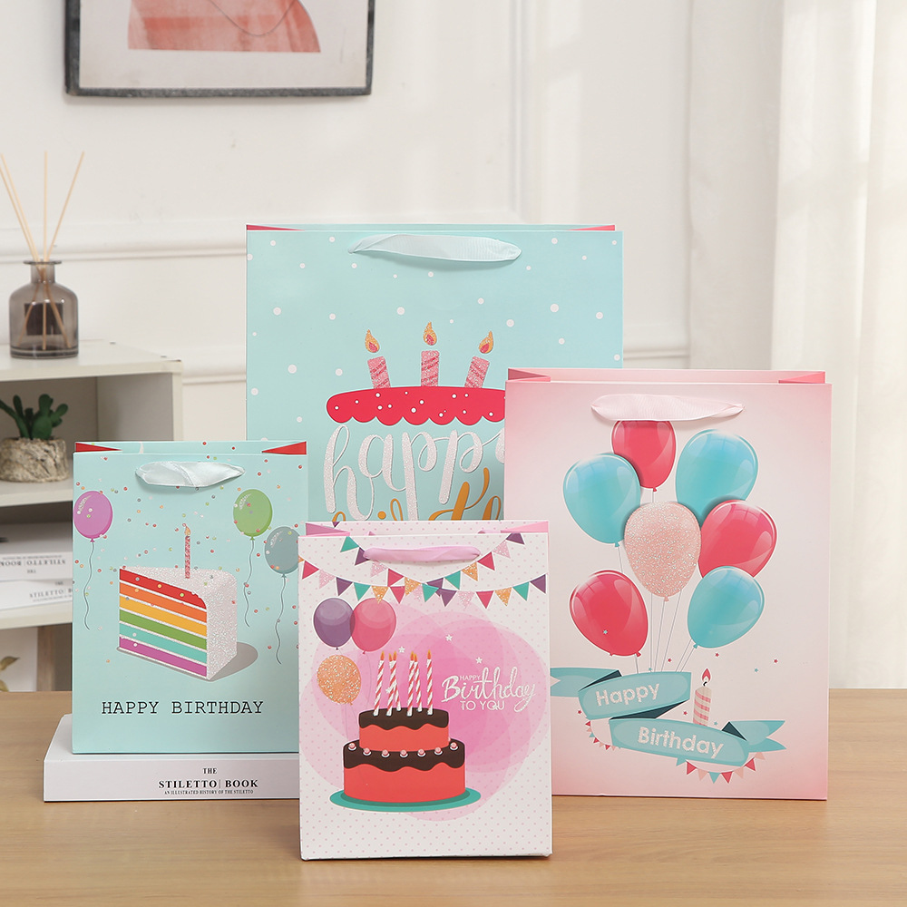 2025新款礼品袋创意卡通图案牛皮纸袋儿童生日礼品手提袋现货批发