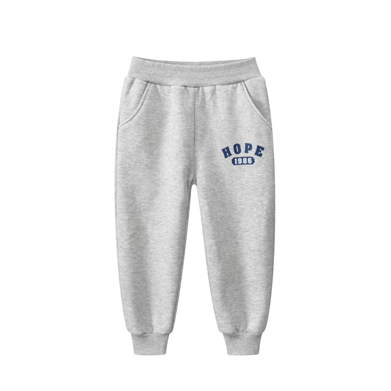 27 niños estilo coreano ropa para niños pantalones largos para niños transfronterizos letras deportes para niños Pantalones deportivos con cordones de lana entrega de una sola pieza