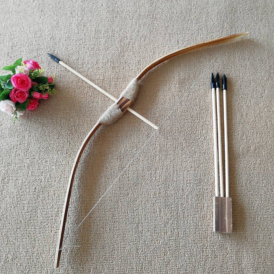 wooden bow and arrows